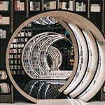 wooden circle with mirrored effect in a library